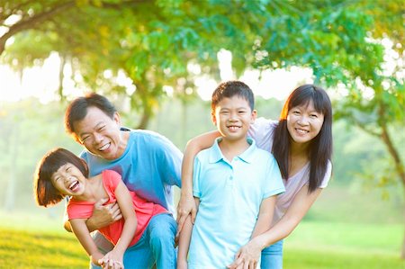 Happy Asian Family Outdoor Lifestyle Stock Photo - Budget Royalty-Free & Subscription, Code: 400-06363755