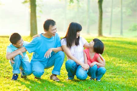 Outdoor park happy Asian family Stock Photo - Budget Royalty-Free & Subscription, Code: 400-06363760