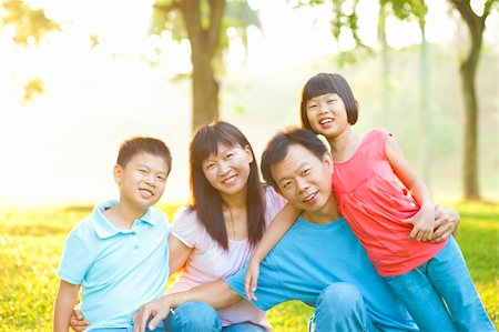 Attractive Asian Family Outdoor Lifestyle Stock Photo - Budget Royalty-Free & Subscription, Code: 400-06363761