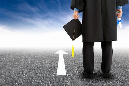 diploma hat students - graduate standing on the road and forward arrow Stock Photo - Budget Royalty-Free & Subscription, Code: 400-06363915