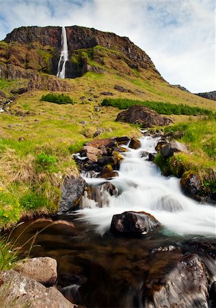 simsearch:400-07756743,k - Beautiful Icelandic waterfall. It is located on the West of the island. Foto de stock - Super Valor sin royalties y Suscripción, Código: 400-06384099