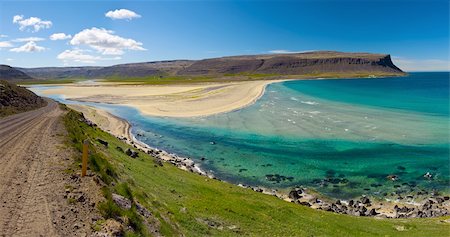 Extremly beautiful bay with mighty golden beaches and turquise sea in the West Fjords, Iceland. Panoramic photo Stock Photo - Budget Royalty-Free & Subscription, Code: 400-06384166