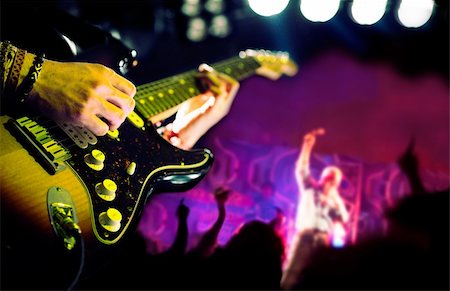 rock band group - Live music background,Guitar player and public Stock Photo - Budget Royalty-Free & Subscription, Code: 400-06386853