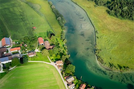 picture of house with high grass - An image of a flight over the bavarian landscape Stock Photo - Budget Royalty-Free & Subscription, Code: 400-06386875