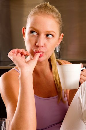 food tattoos - woman at home having breakfast Stock Photo - Budget Royalty-Free & Subscription, Code: 400-06387028