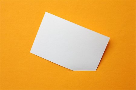 white paper card on orange background Stock Photo - Budget Royalty-Free & Subscription, Code: 400-06387297