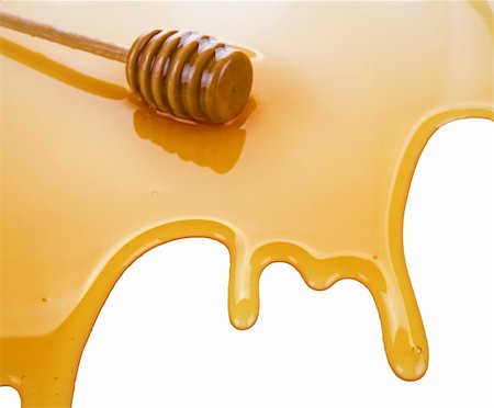 dripping honey - puddle of honey with wooden stick isolated on white background Stock Photo - Budget Royalty-Free & Subscription, Code: 400-06387884