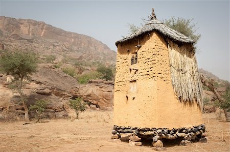 dogon rocks - The Dogon are best known for their mythology, their mask dances, wooden sculpture and their architecture. Foto de stock - Super Valor sin royalties y Suscripción, Código: 400-06388316