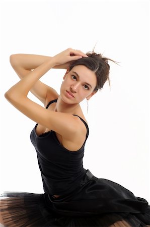 female ballet dancer in black dress holding her hair isolated on white Stock Photo - Budget Royalty-Free & Subscription, Code: 400-06388972