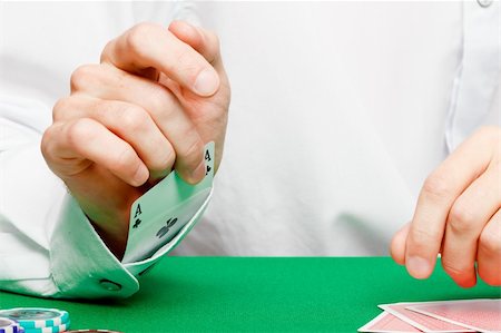 simsearch:400-06389082,k - männliche Spieler am Kartentisch im Casino Stockbilder - Microstock & Abonnement, Bildnummer: 400-06389082