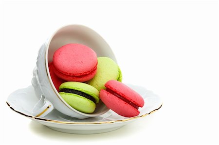 pink macaroon - Colorful French almond cakes in a cup on a white background. Stock Photo - Budget Royalty-Free & Subscription, Code: 400-06389250