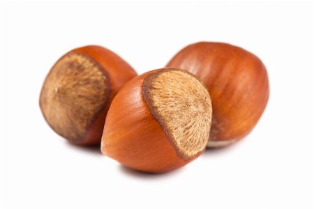 simsearch:400-06520688,k - Three ripe hazelnuts isolated on white background Stock Photo - Budget Royalty-Free & Subscription, Code: 400-06389421