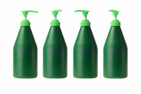 Four Green Plastic Bottles in a Row on White Background Stock Photo - Budget Royalty-Free & Subscription, Code: 400-06389459
