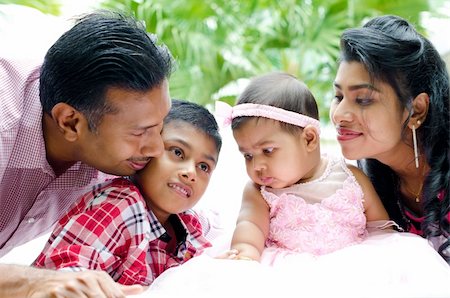 Happy Indian family having fun time at outdoor Stock Photo - Budget Royalty-Free & Subscription, Code: 400-06389663