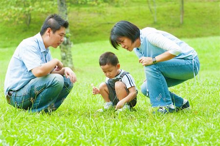 family healthy candid - Candid Asian family at outdoors Stock Photo - Budget Royalty-Free & Subscription, Code: 400-06394089