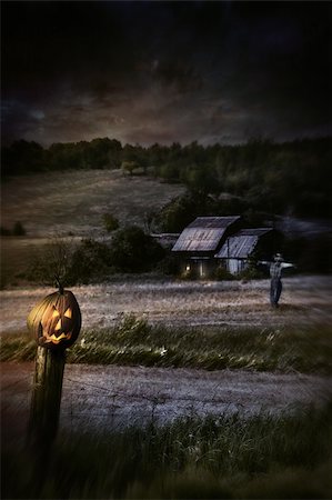 scarecrow farm - Eerie night scene with Halloween pumpkin on fence Stock Photo - Budget Royalty-Free & Subscription, Code: 400-06394299