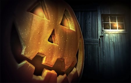 spooky night sky - Glowing pumpkin at night in front of barn door Stock Photo - Budget Royalty-Free & Subscription, Code: 400-06394300