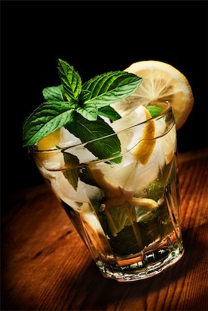 Mojito cocktail on rustic wooden background Stock Photo - Budget Royalty-Free & Subscription, Code: 400-06394376