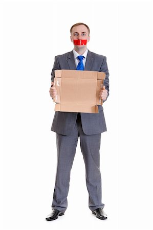 simsearch:400-06364563,k - Businessman separates the red tape from his mouth Stock Photo - Budget Royalty-Free & Subscription, Code: 400-06394450
