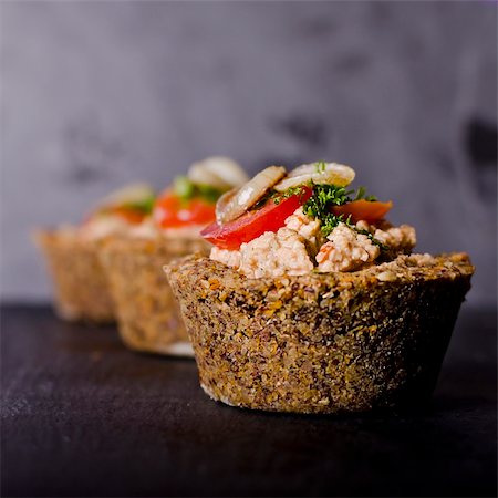 vegan raw food quiche with nut filling and vegetables on top Stock Photo - Budget Royalty-Free & Subscription, Code: 400-06394466