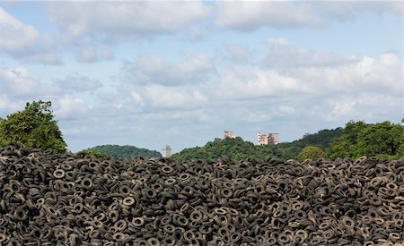 scrap yard pile of cars - Heap of old Tires  in recycling plant in Thailand Stock Photo - Budget Royalty-Free & Subscription, Code: 400-06394526