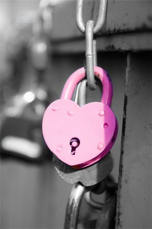 pzromashka (artist) - pink wedding lock hanging on the bridge Stock Photo - Budget Royalty-Free & Subscription, Code: 400-06394877