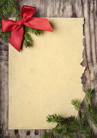 Christmas decoration and vintage paper on wooden background Stock Photo - Budget Royalty-Free & Subscription, Code: 400-06395316