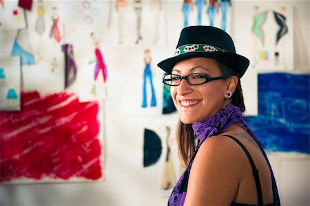 Confident entrepreneur, portrait of happy hispanic young woman working as fashion designer and dressmaker in atelier Stock Photo - Budget Royalty-Free & Subscription, Code: 400-06395931