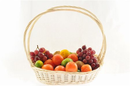 simsearch:400-09220883,k - A basketful of various fruits on a white background Stock Photo - Budget Royalty-Free & Subscription, Code: 400-06396325