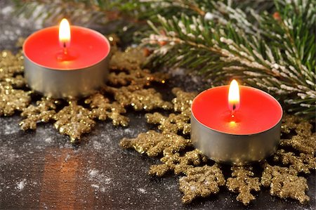 Red christmas candles on a golden snowflakes. Stock Photo - Budget Royalty-Free & Subscription, Code: 400-06396462