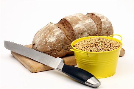 simsearch:400-08428404,k - sowing wheat seed, bread and knife Stock Photo - Budget Royalty-Free & Subscription, Code: 400-06396638