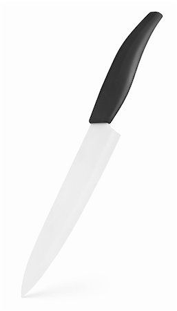 Ceramic knife stands vertically on white with clipping path Stock Photo - Budget Royalty-Free & Subscription, Code: 400-06396722