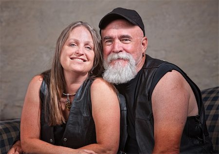 Adorable mature biker couple wearing leather vests Stock Photo - Budget Royalty-Free & Subscription, Code: 400-06396857
