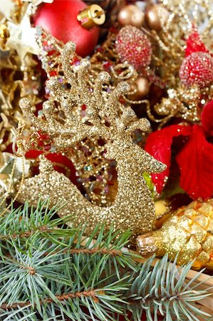 Christmas decoration with golden deer and fir branch. Stock Photo - Budget Royalty-Free & Subscription, Code: 400-06397210