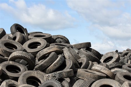 scrap yard pile of cars - Heap of old Tires  in recycling plant in Thailand Stock Photo - Budget Royalty-Free & Subscription, Code: 400-06397322