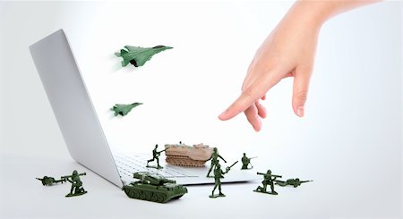 plane tablet - Computer security concept :  soldiers,tank,plane  are guarding a laptop from viruses, spyware and hacker with hand Stock Photo - Budget Royalty-Free & Subscription, Code: 400-06390111