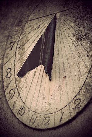 Close up of ancient sundial on rock Stock Photo - Budget Royalty-Free & Subscription, Code: 400-06390260