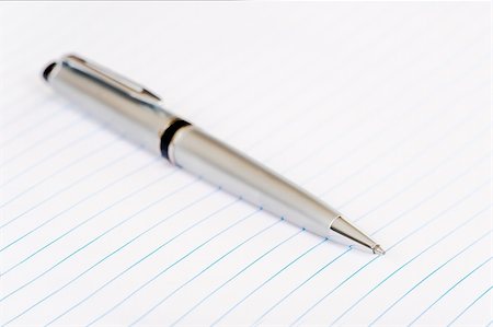 simsearch:400-05122820,k - an elegant silver pen with some lined note paper Stock Photo - Budget Royalty-Free & Subscription, Code: 400-06390438