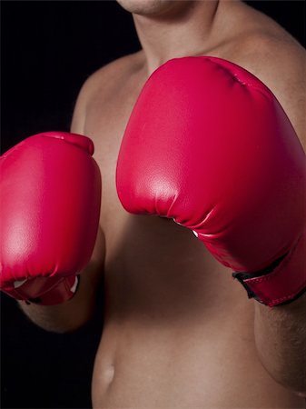Rumpf des Boxers in Handschuhen der roten Farbe Stockbilder - Microstock & Abonnement, Bildnummer: 400-06390526