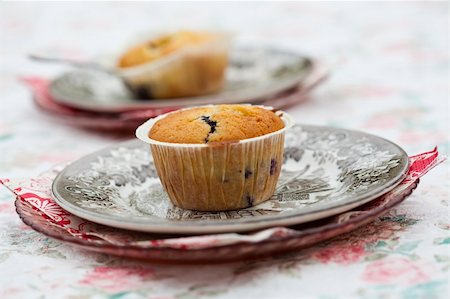 simsearch:400-06365777,k - Close-up of delicious home-made blueberry muffins on a plate Stock Photo - Budget Royalty-Free & Subscription, Code: 400-06390634