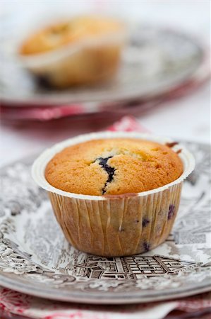 simsearch:400-06365777,k - Close-up of delicious home-made blueberry muffins on a plate Stock Photo - Budget Royalty-Free & Subscription, Code: 400-06390632