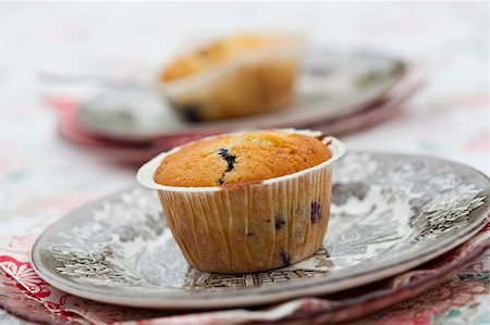 simsearch:400-07034479,k - Close-up of delicious home-made blueberry muffins on a plate Stock Photo - Budget Royalty-Free & Subscription, Code: 400-06390633