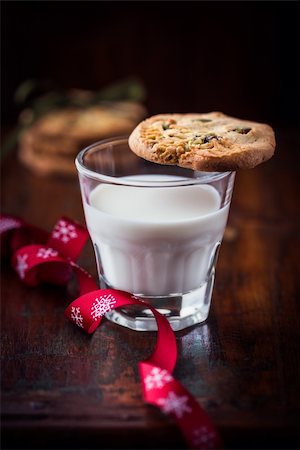 butter cookie with pistachios and a glass of milk for christmas Stock Photo - Budget Royalty-Free & Subscription, Code: 400-06390701