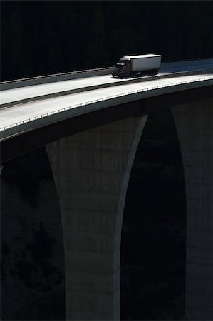 semi truck on highway image - Semi trailer truck crossing a high level bridge in British Columbia, Canada Stock Photo - Budget Royalty-Free & Subscription, Code: 400-06391073
