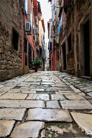 Narrow Street in the City of Rovinj, Croatia Stock Photo - Budget Royalty-Free & Subscription, Code: 400-06391343