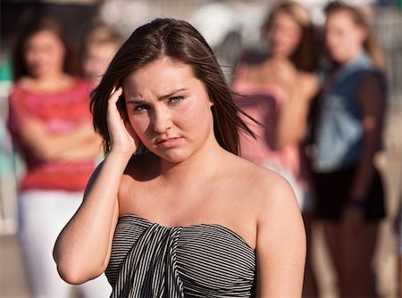 peer pressure - Sad European teenage girl with hand near head Foto de stock - Super Valor sin royalties y Suscripción, Código: 400-06391966