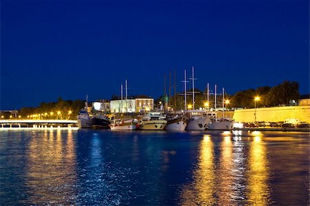 simsearch:400-05718887,k - Fishing boats in safe harbor on evening in Zadar, Croatia, Dalmatia Foto de stock - Royalty-Free Super Valor e Assinatura, Número: 400-06392331