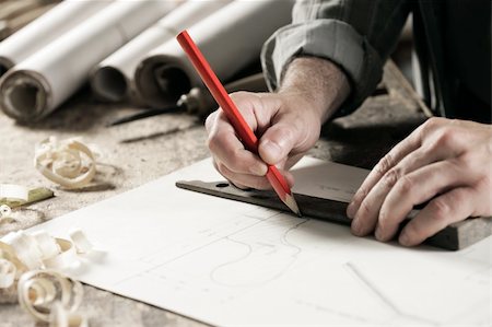 simsearch:400-04710606,k - Closeup  view of a carpenter using a red pencil to draw a line on a blueprint Stock Photo - Budget Royalty-Free & Subscription, Code: 400-06392550