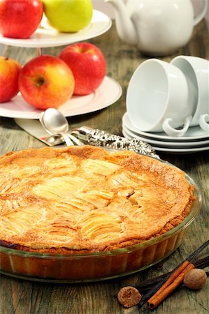 simsearch:400-07428504,k - Alsatian apple pie and cup of tea on a wooden table. Stock Photo - Budget Royalty-Free & Subscription, Code: 400-06393335