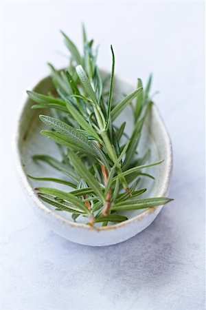rosemary sprig - rosemary sprigs in a ceramic bowl Stock Photo - Budget Royalty-Free & Subscription, Code: 400-06393701